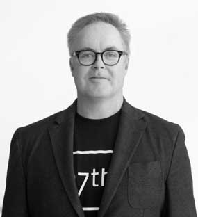 Portrait of Julian Ward, founder and CEO of 7DX.